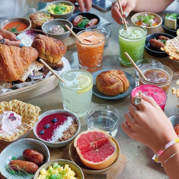 Brunch with fruit, bread and juice