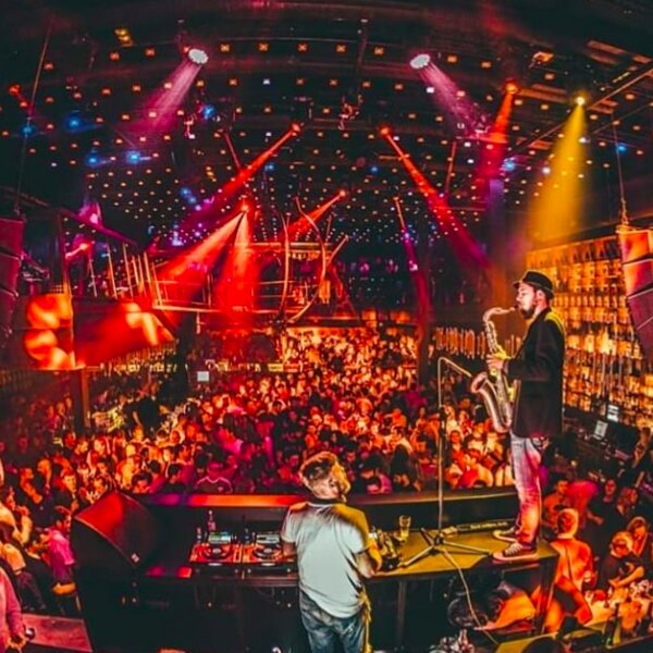 dj with live musician in club in split