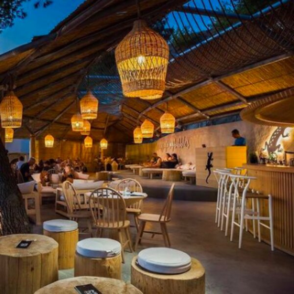 people drinking at cosy beachside bar split