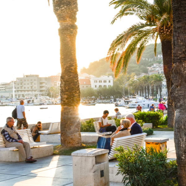 people enjoying the sun on split's riva promenade
