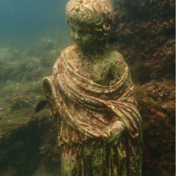 statue underwater in the lost city of Baiae