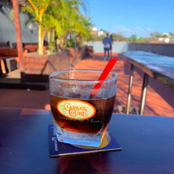 glass of clarke's court rum in grenada