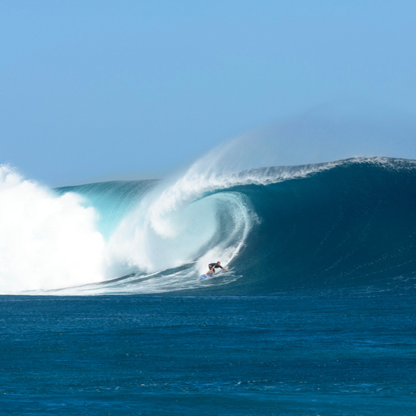 surfer in sea off fiji island