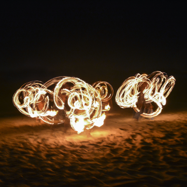 fire dancing show being performed on nadi in fiji