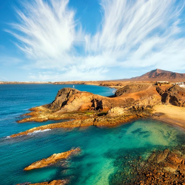 lanzarote beach with turquoise waters and golden sand