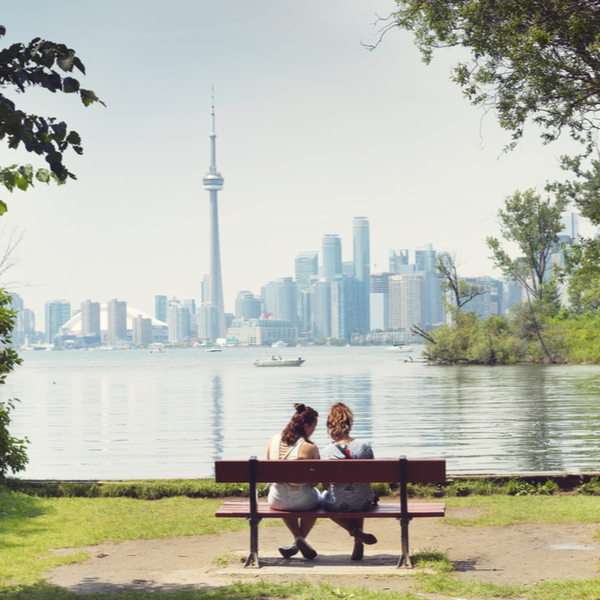 people viewing toronto skyline from toronto island park