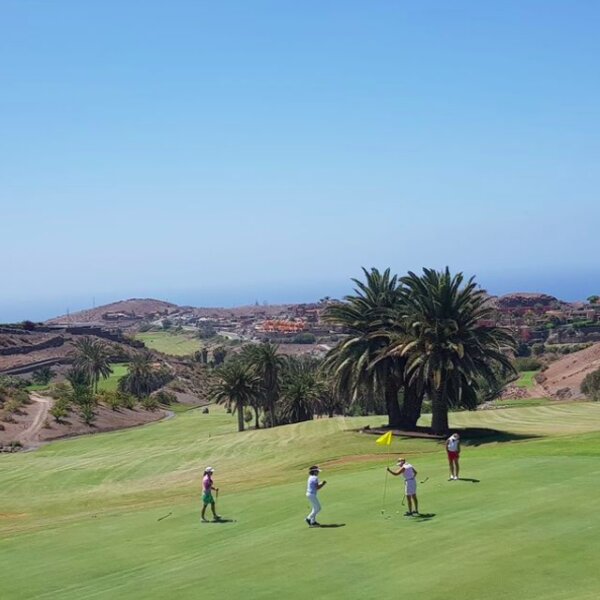 people playing round of golf on the old course in gran canaria
