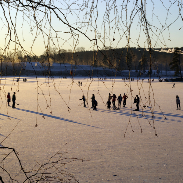 people skating on frozen lake Bogstadvannet in Oslo