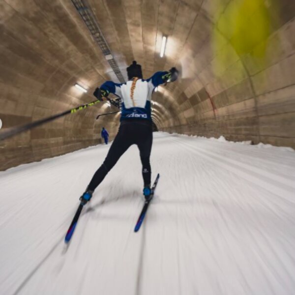 skiing through a tunnel in lapland