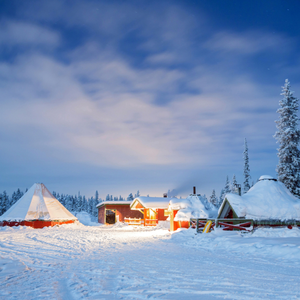 cabins covered in snow at lapland in winter