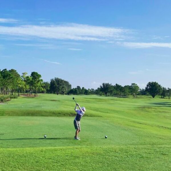 person playing golf at a course in orlando