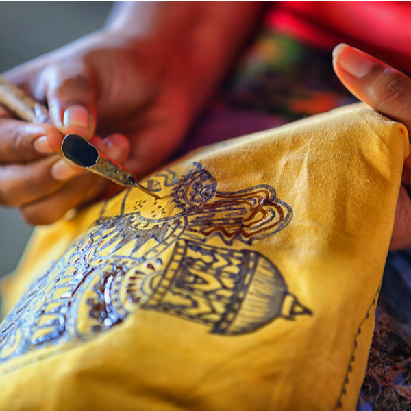artist making traditional print in sri lanka