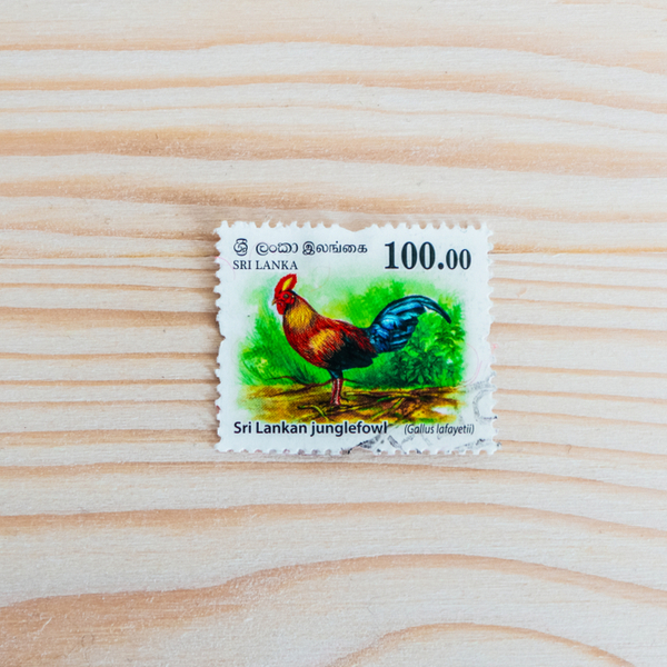 sri lankan stamp with junglefowl symbol