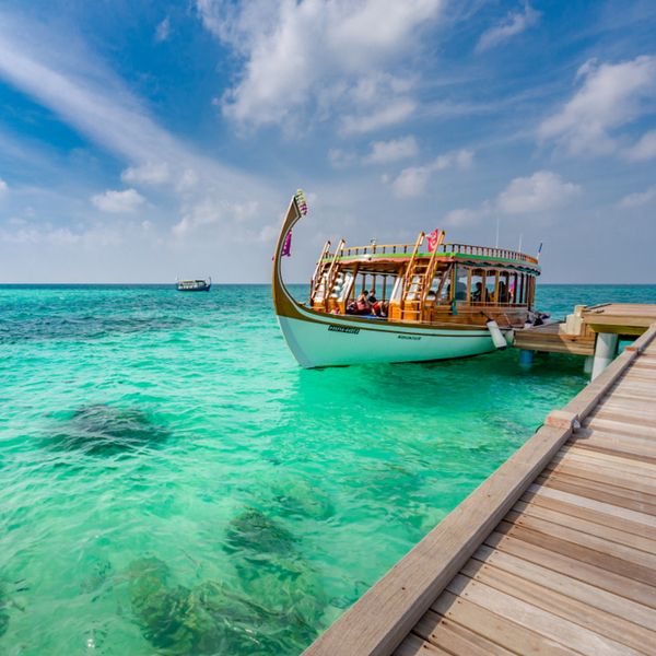 people waiting for a dhoni ride in maldives