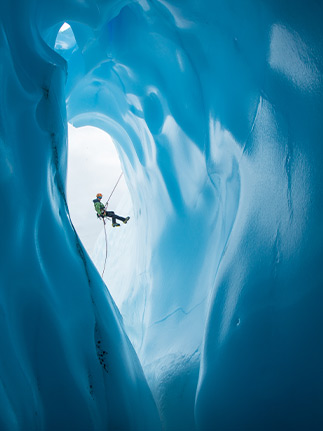 climber in glacier in alaska