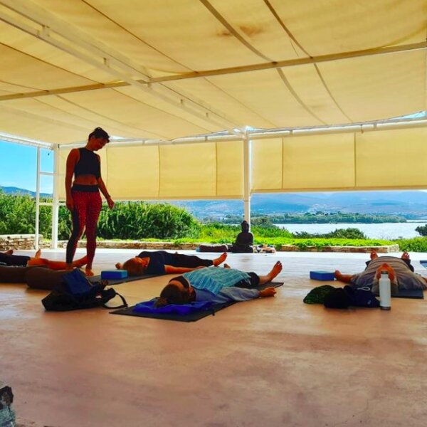 people doing yoga at a retreat in goa