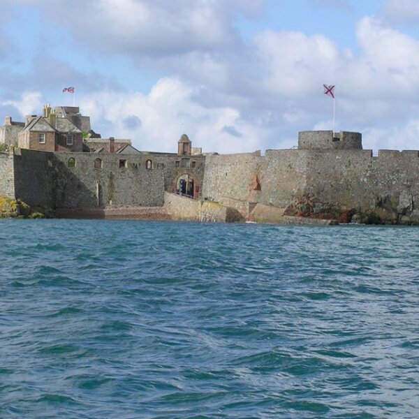 view of elizabeth castle in jersey from the ferry