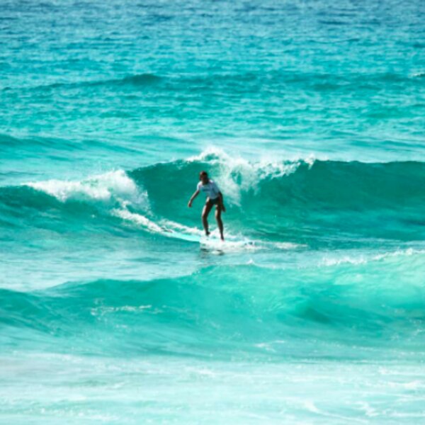 person surfing at kalamaki in crete
