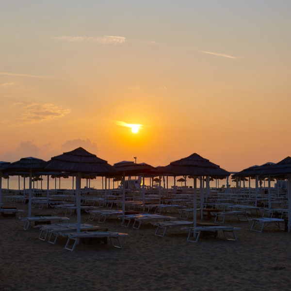 sun loungers at a quiet beach in lascari sicily