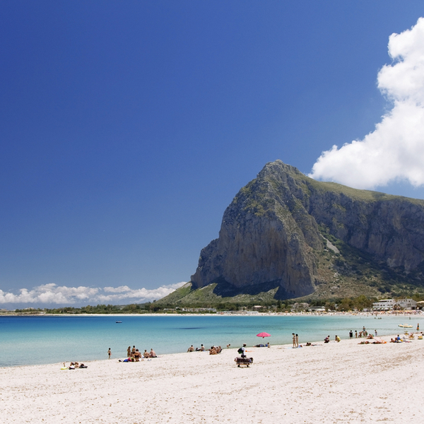 people lounging at one of the best beaches in sicily