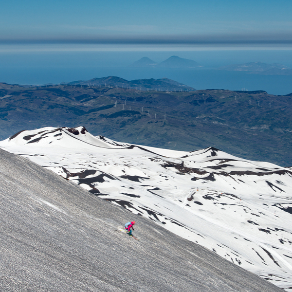 skiing down mount etna