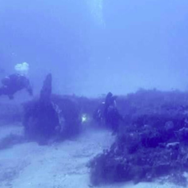 diving with a plane wreck in sicily beach
