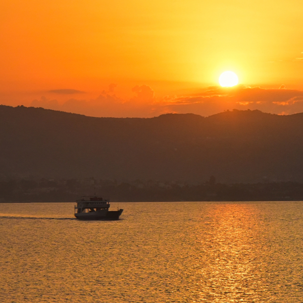 boat tour in kefalonia at sunset