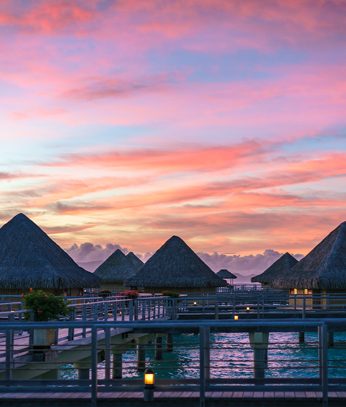 Sunset over villas in Bora Bora