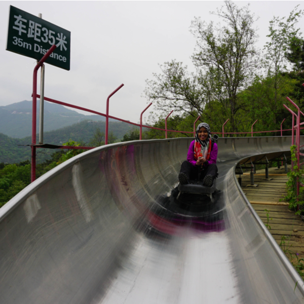 sliding down the great wall of china