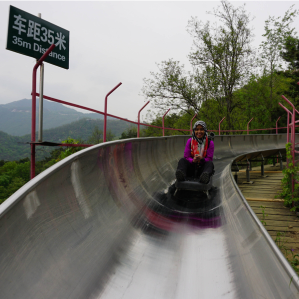 sliding down the great wall of china