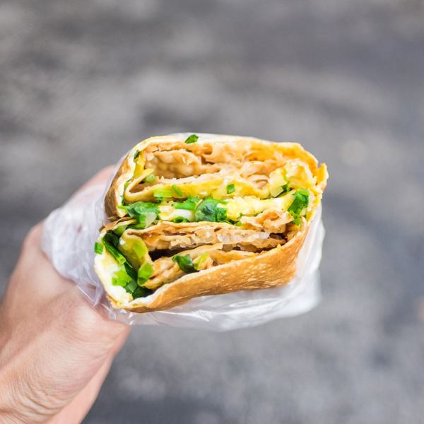 eating jianbing in beijing