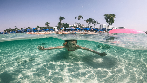 cyprus half term girl swimming in pool
