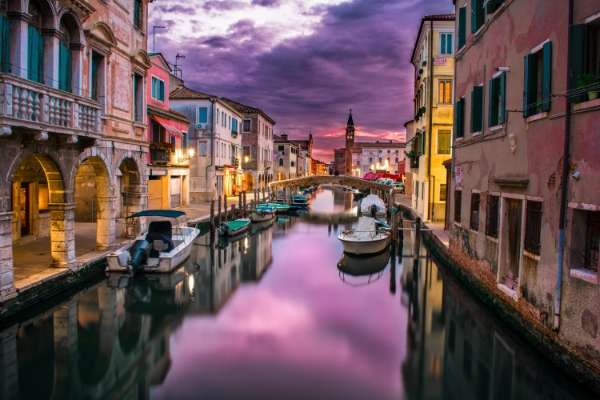 Venice in Italy canal ways at sunset