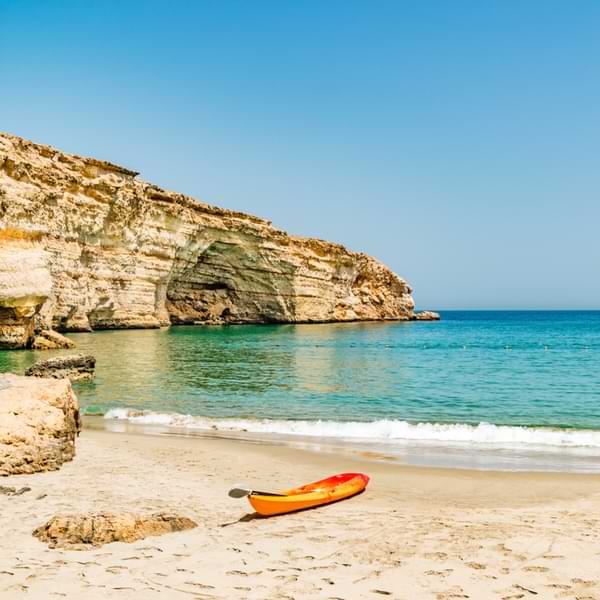 Barr Al Jissah beach in Oman with a kayak