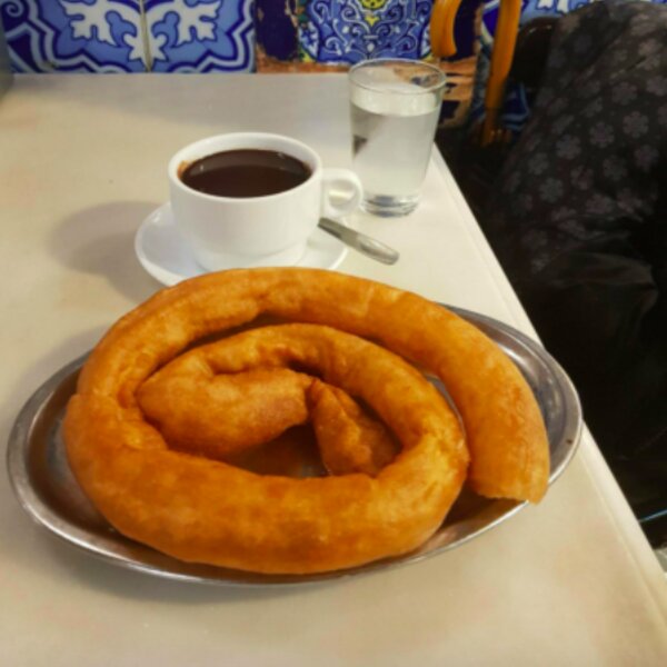 eating churros in seville