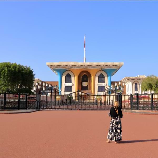 woman with covered legs in oman