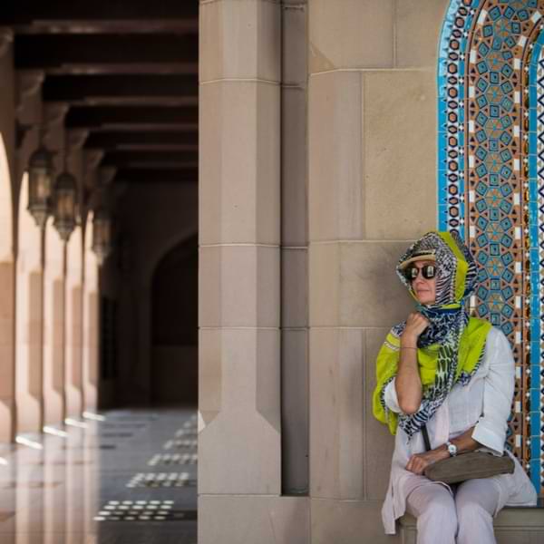 woman with covered head at oman mosque