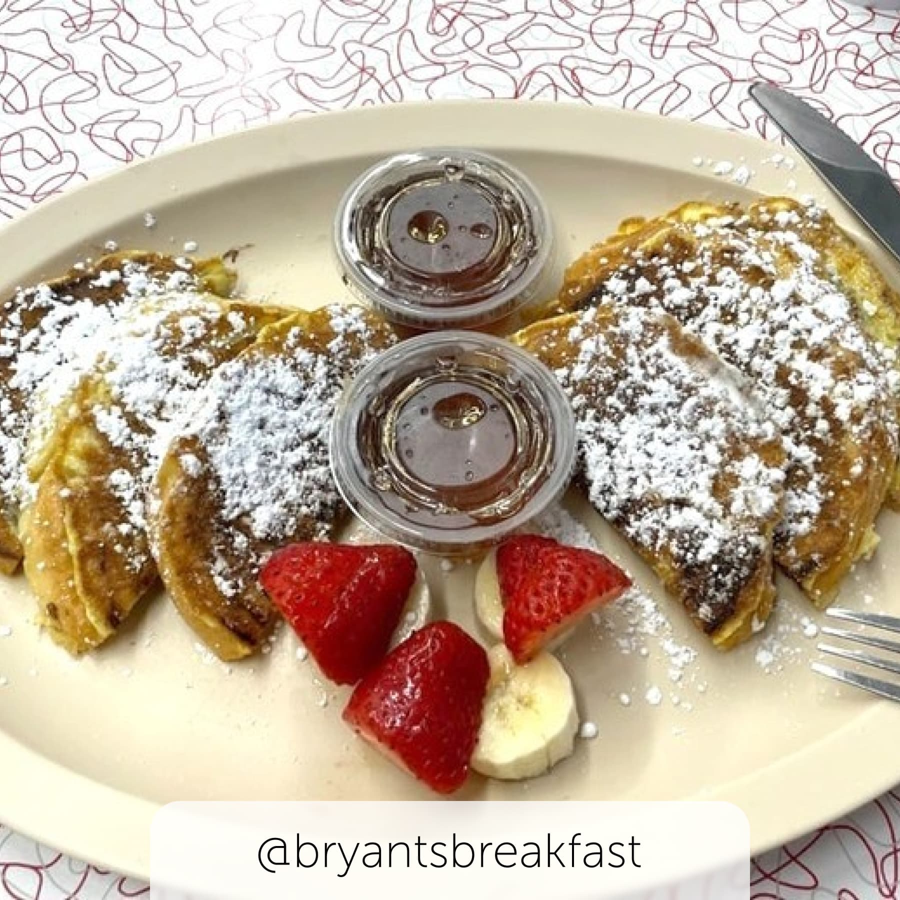 Pancake breakfast with strawberries and honey at Bryant's