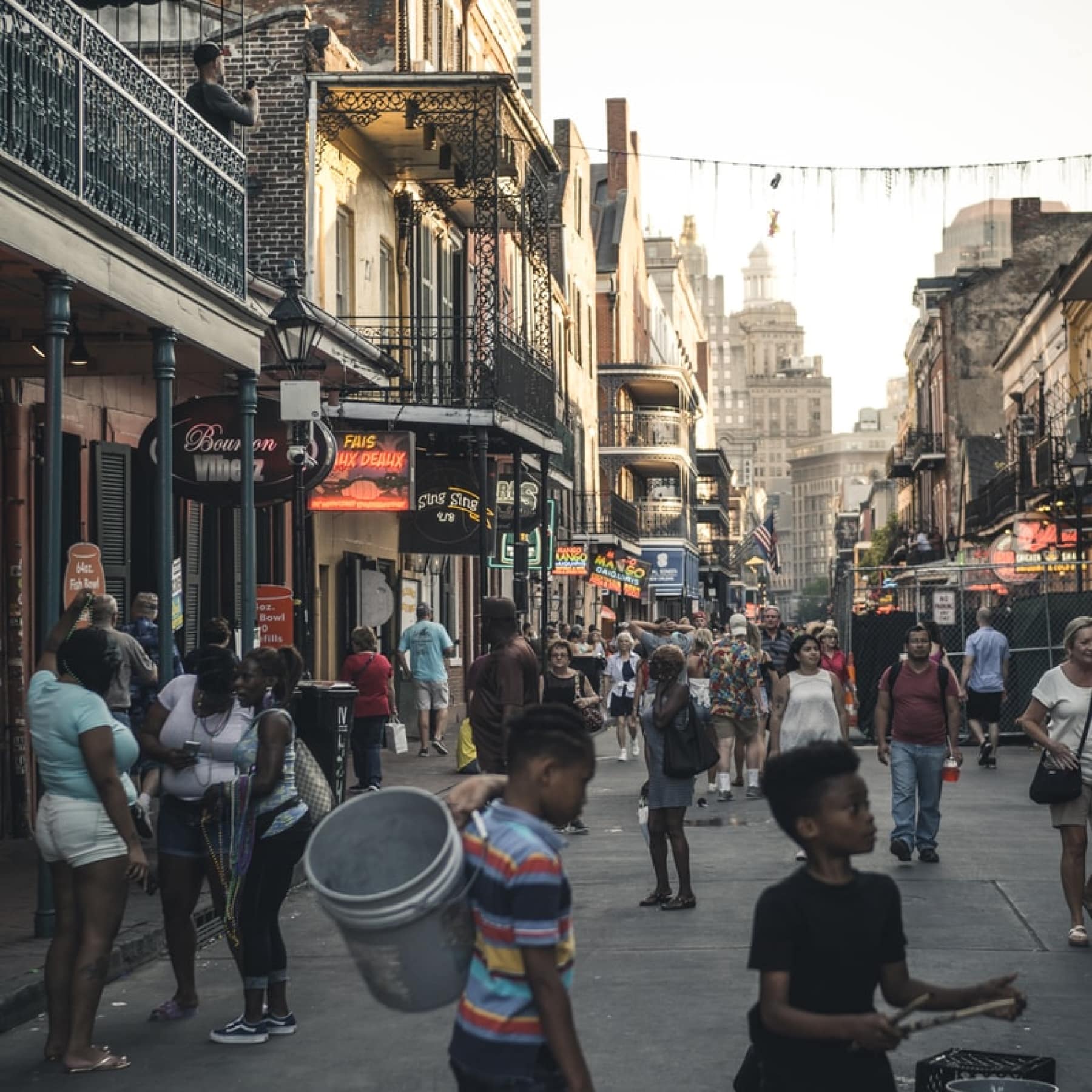 Children enjoy the Mardi Gras celebrations on the streets of New Orleans