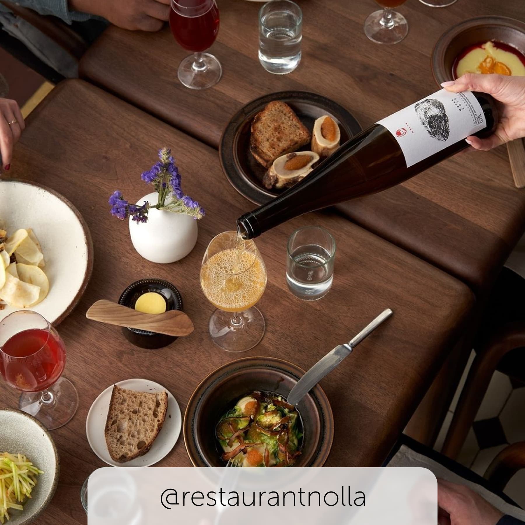 Wine gets served at Nolla restaurant