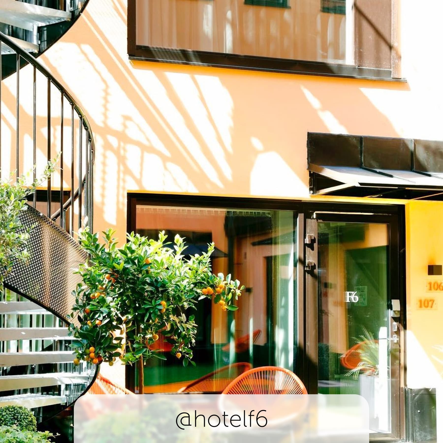 Outside Hotel F6, the colour pops from the building in the sunlight