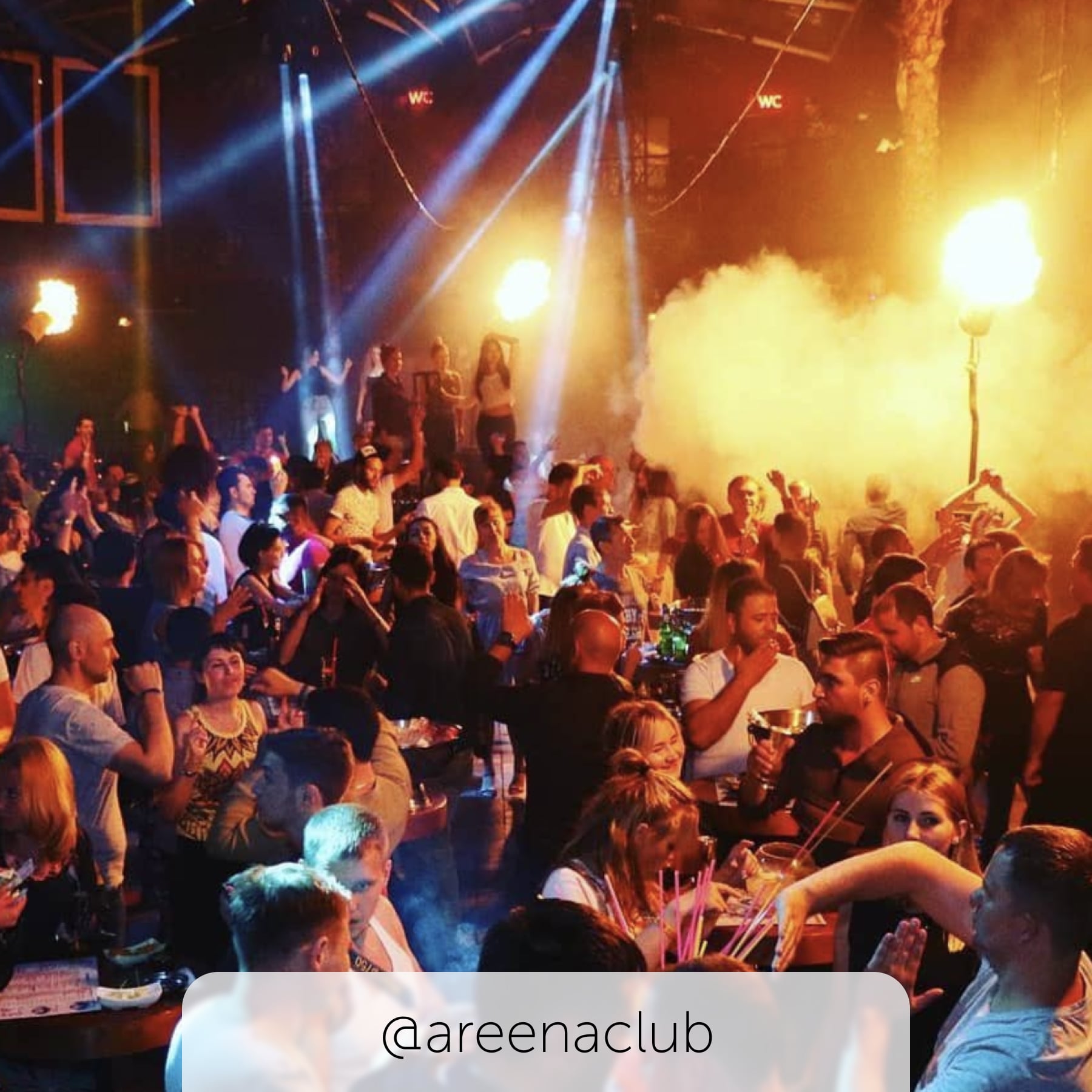 People dancing in areena nightclub